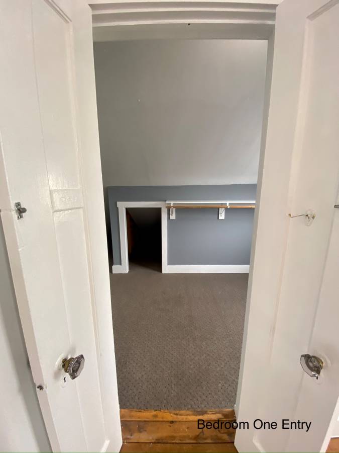 Bedroom One doorway view — Image 11